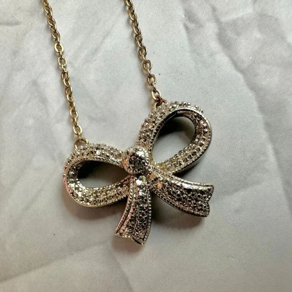 PAJ Silver and gold Tone Textured Bow Pendant Necklace - Picture 3 of 8